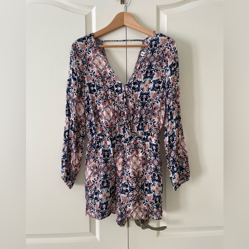 Fun long sleeve romper shorts.